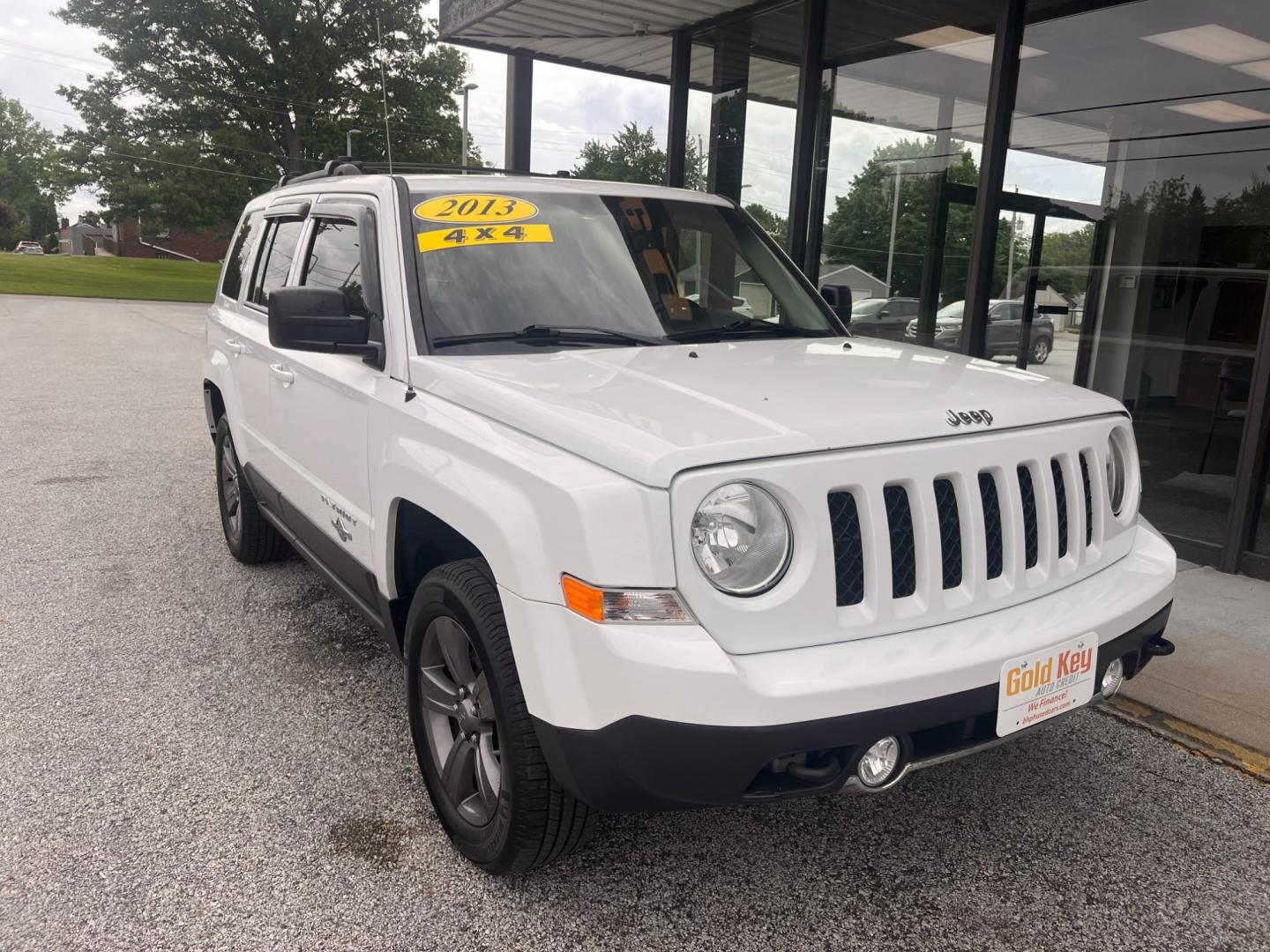 2013 Bright White Jeep Patriot Latitude 4WD (1C4NJRFB5DD) with an 2.4L L4 DOHC 16V engine, located at 1633 W Kimberly, Davenport, IA, 52806, (563) 323-5341, 41.559456, -90.598732 - Photo#1